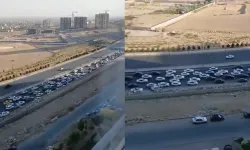 İran'da uzun araç kuyrukları