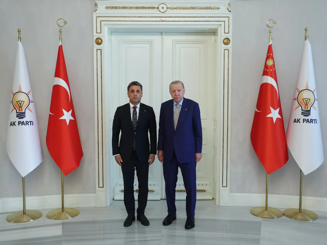 Cumhurbaşkanı Erdoğan ve Tunceli İl Başkanlığına atanan Recai Hazar
